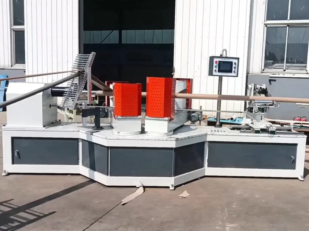 NRC Automatic Spiral Paper Core Machine with stainless steel body, producing high-speed packaging cores